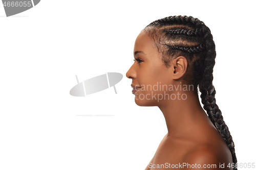 Image of Portrait of beautiful african-american woman isolated on white studio background. Beauty, fashion, skincare, cosmetics concept.