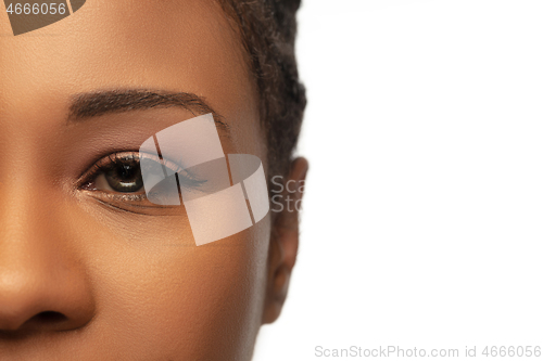 Image of Portrait of beautiful african-american woman isolated on white studio background. Beauty, fashion, skincare, cosmetics concept.