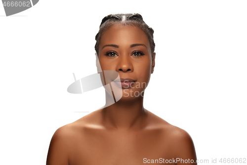 Image of Portrait of beautiful african-american woman isolated on white studio background. Beauty, fashion, skincare, cosmetics concept.