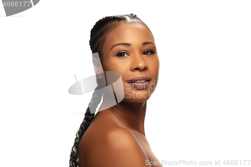 Image of Portrait of beautiful african-american woman isolated on white studio background. Beauty, fashion, skincare, cosmetics concept.