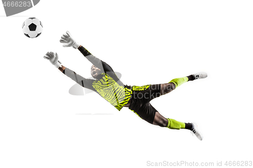 Image of One soccer player goalkeeper man catching ball