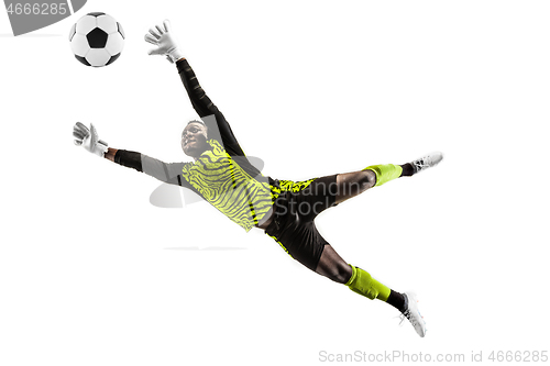 Image of One soccer player goalkeeper man catching ball