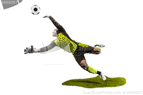 Image of One soccer player goalkeeper man catching ball