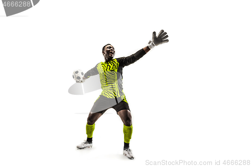 Image of one soccer player goalkeeper man throwing ball