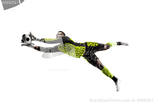 Image of One soccer player goalkeeper man catching ball