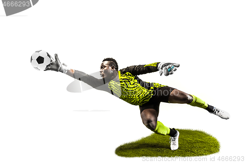 Image of One soccer player goalkeeper man catching ball