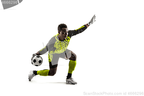 Image of one soccer player goalkeeper man throwing ball