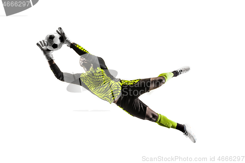 Image of One soccer player goalkeeper man catching ball