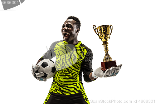 Image of The winner soccer player with ball isolated on white background