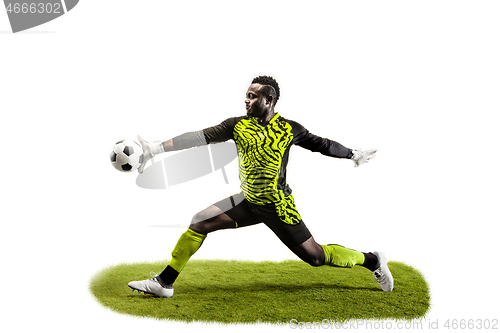 Image of One soccer player goalkeeper man catching ball