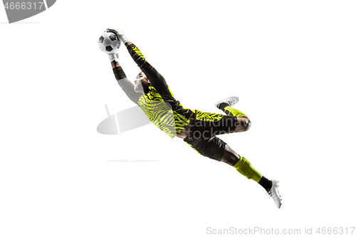 Image of One soccer player goalkeeper man catching ball