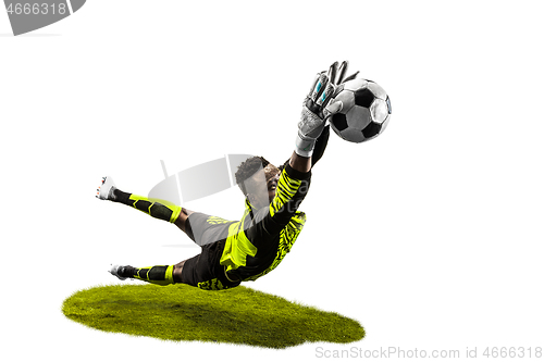 Image of One soccer player goalkeeper man catching ball