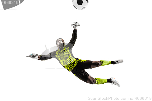 Image of One soccer player goalkeeper man catching ball