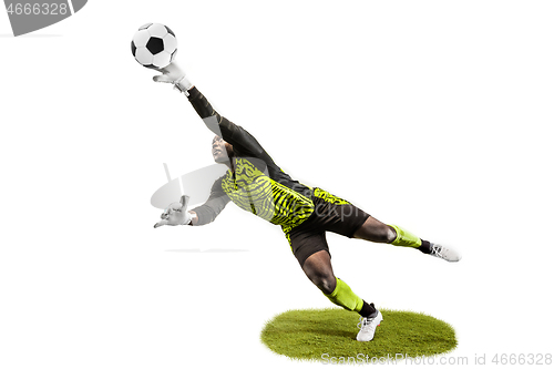 Image of One soccer player goalkeeper man catching ball