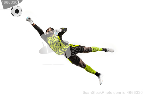 Image of One soccer player goalkeeper man catching ball