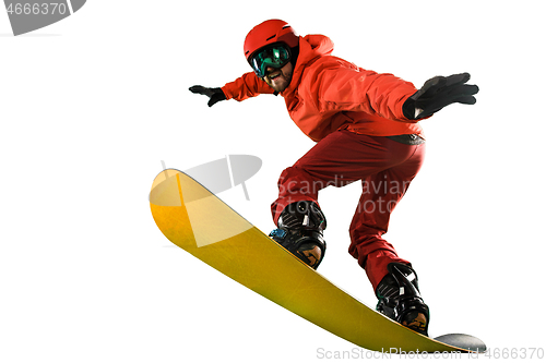 Image of Portrait of young man in sportswear with snowboard isolated on a white background.