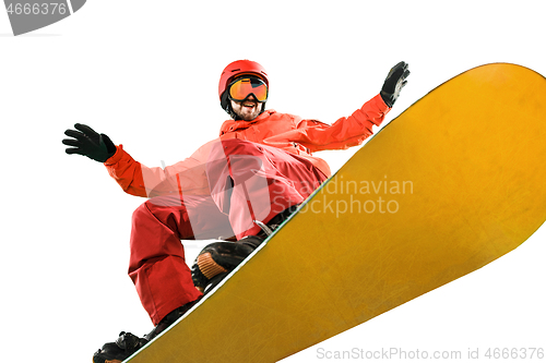 Image of Portrait of young man in sportswear with snowboard isolated on a white background.