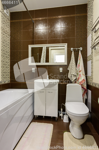 Image of The interior of the bathroom is made in a classic style