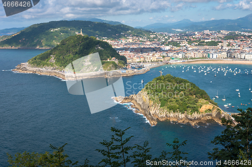 Image of SAN SEBASTIAN, SPAIN- JULY 13, 2020: Aerial view of San Sebastian and Santa Clara Island, Donostia, Spain on a beautiful summer day