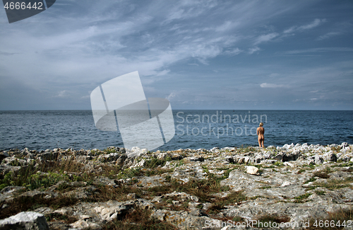 Image of Naked woman on the nudist beach