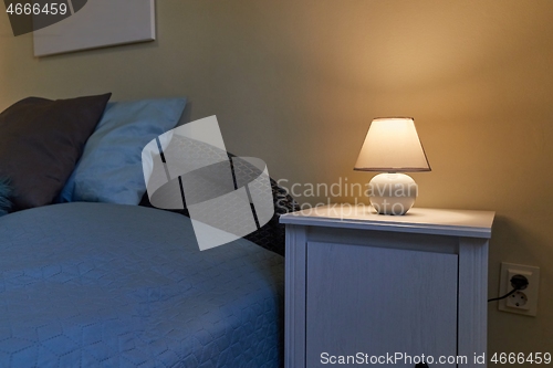 Image of Lamp on a nightstand