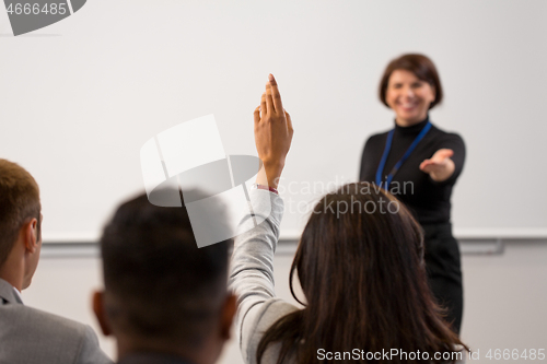 Image of group of people at business conference or lecture