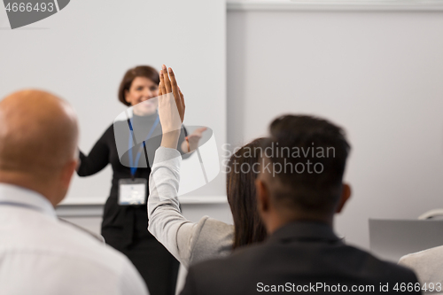 Image of group of people at business conference or lecture