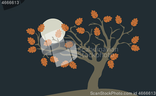 Image of lonely autumn tree with the moon