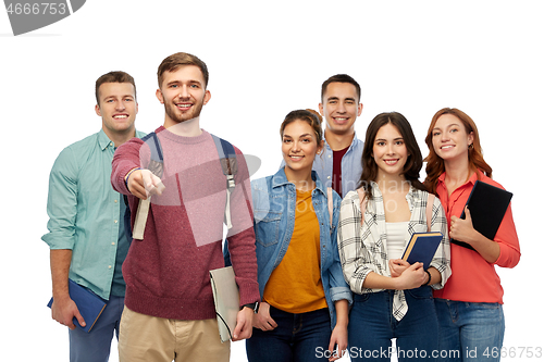 Image of group of students with books and school bags