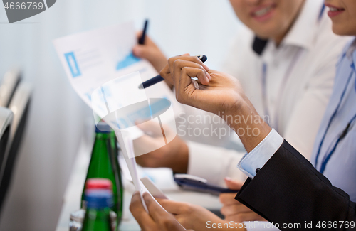 Image of business people at international conference