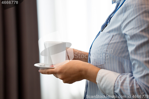 Image of close up of woman drinking coffee