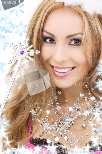 Image of lovely fairy in crown with magic wand