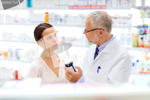 Image of apothecary and woman with drug at pharmacy