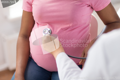 Image of gynecologist doctor and pregnant woman at hospital