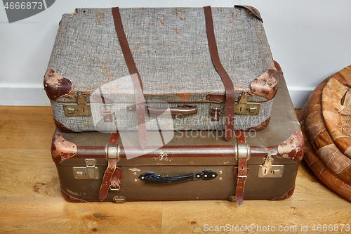Image of Vintage suitcases on the floor