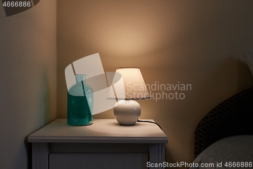 Image of Lamp on a nightstand