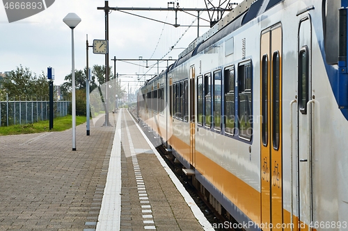 Image of Railway station with passanger train