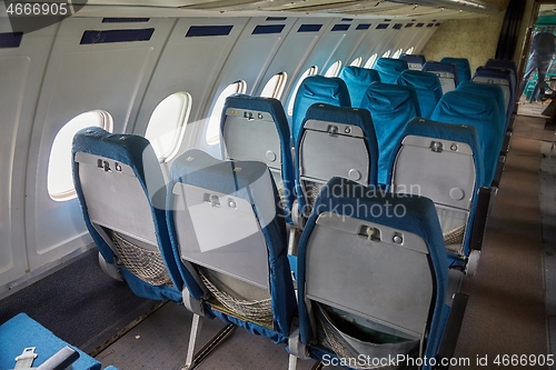 Image of Airliner interior old seats