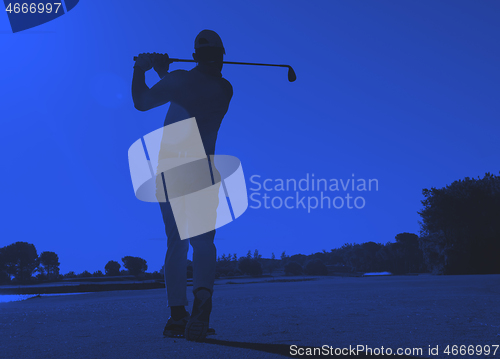 Image of golf player hitting shot