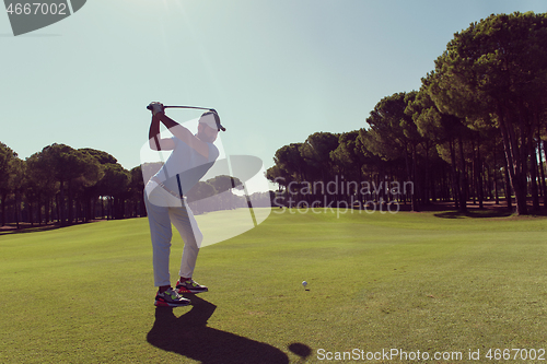 Image of golf player hitting shot