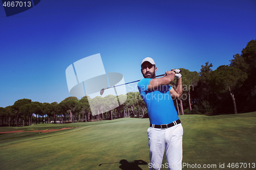 Image of golf player hitting shot