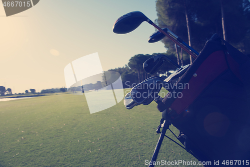 Image of close up golf bag on course