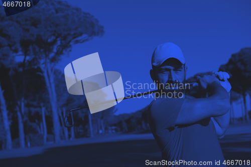 Image of golf player hitting shot