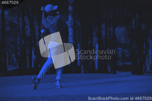 Image of golf player hitting long shot