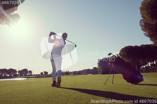 Image of golf player hitting shot