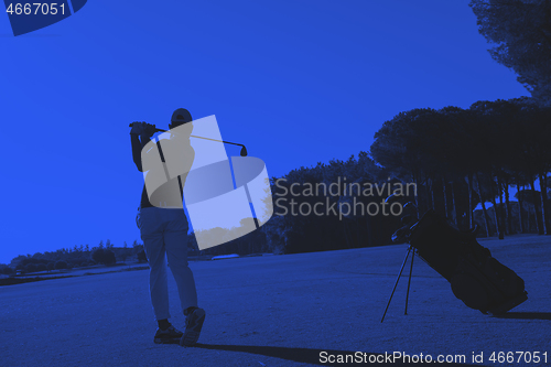 Image of golf player hitting shot