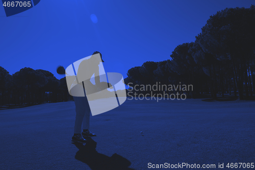 Image of golf player hitting shot