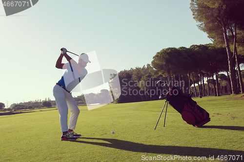 Image of golf player hitting shot