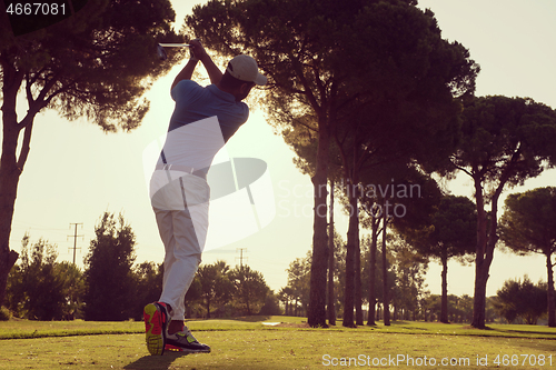 Image of golf player hitting shot