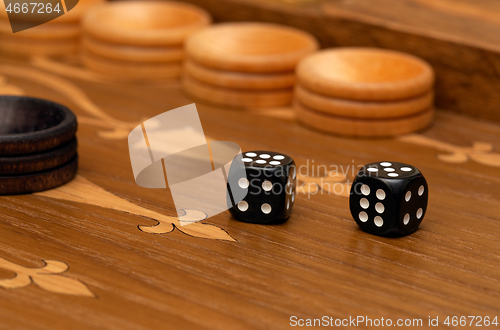 Image of Dice on a backgammon board